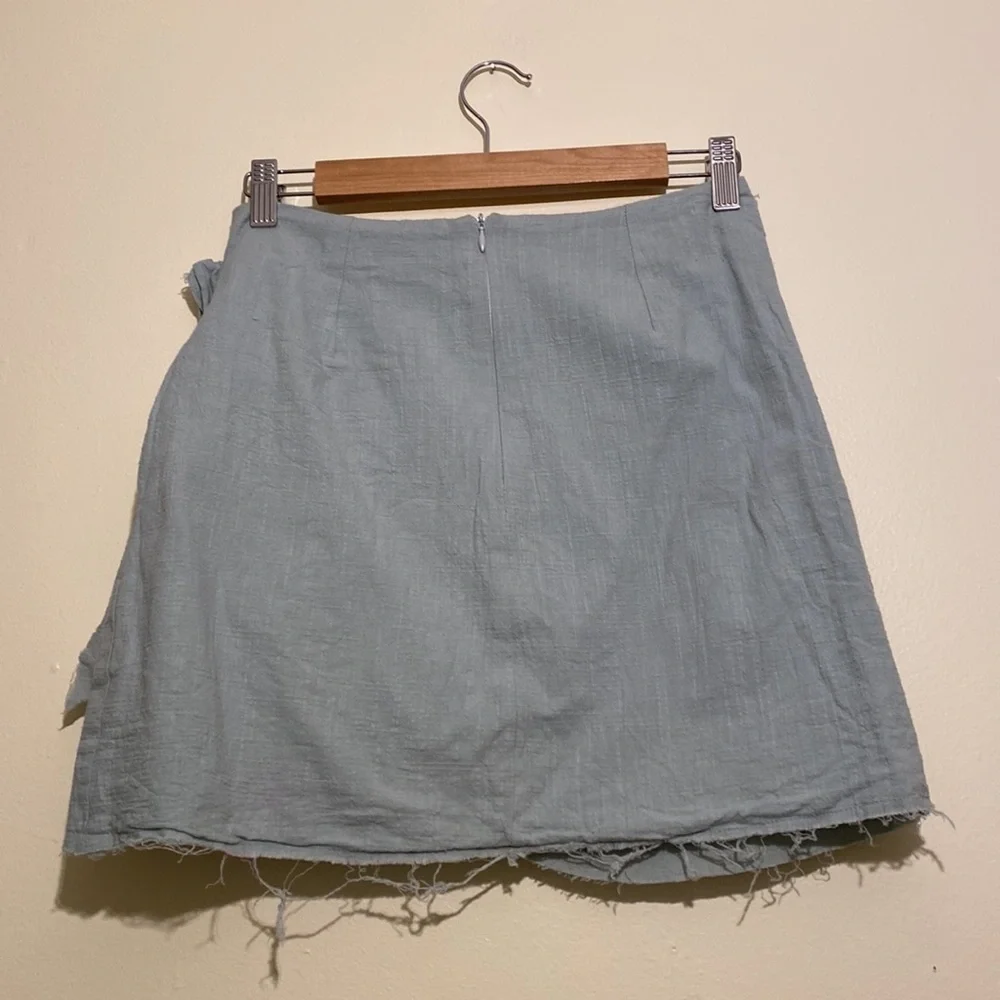 Showpo mint blue cotton mini wrap skirt .Size 4